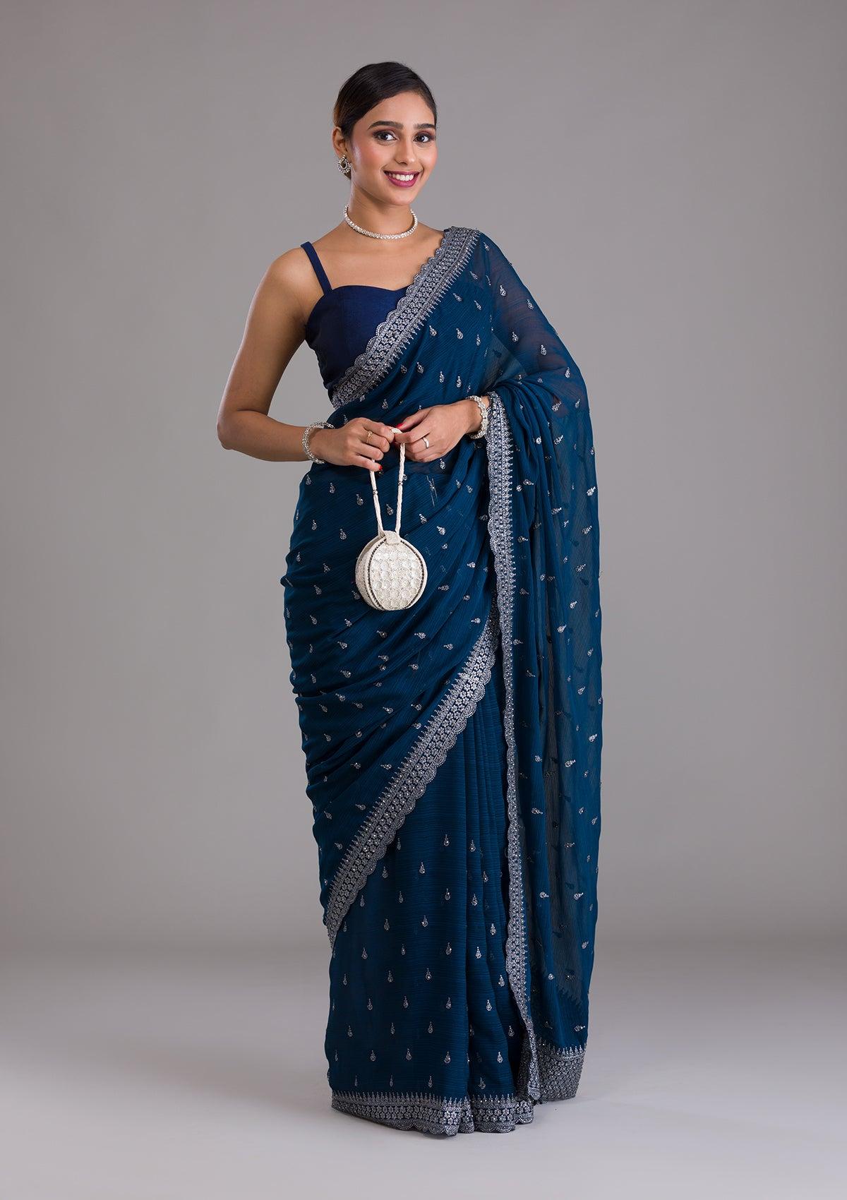 peacock blue stonework georgette designer saree