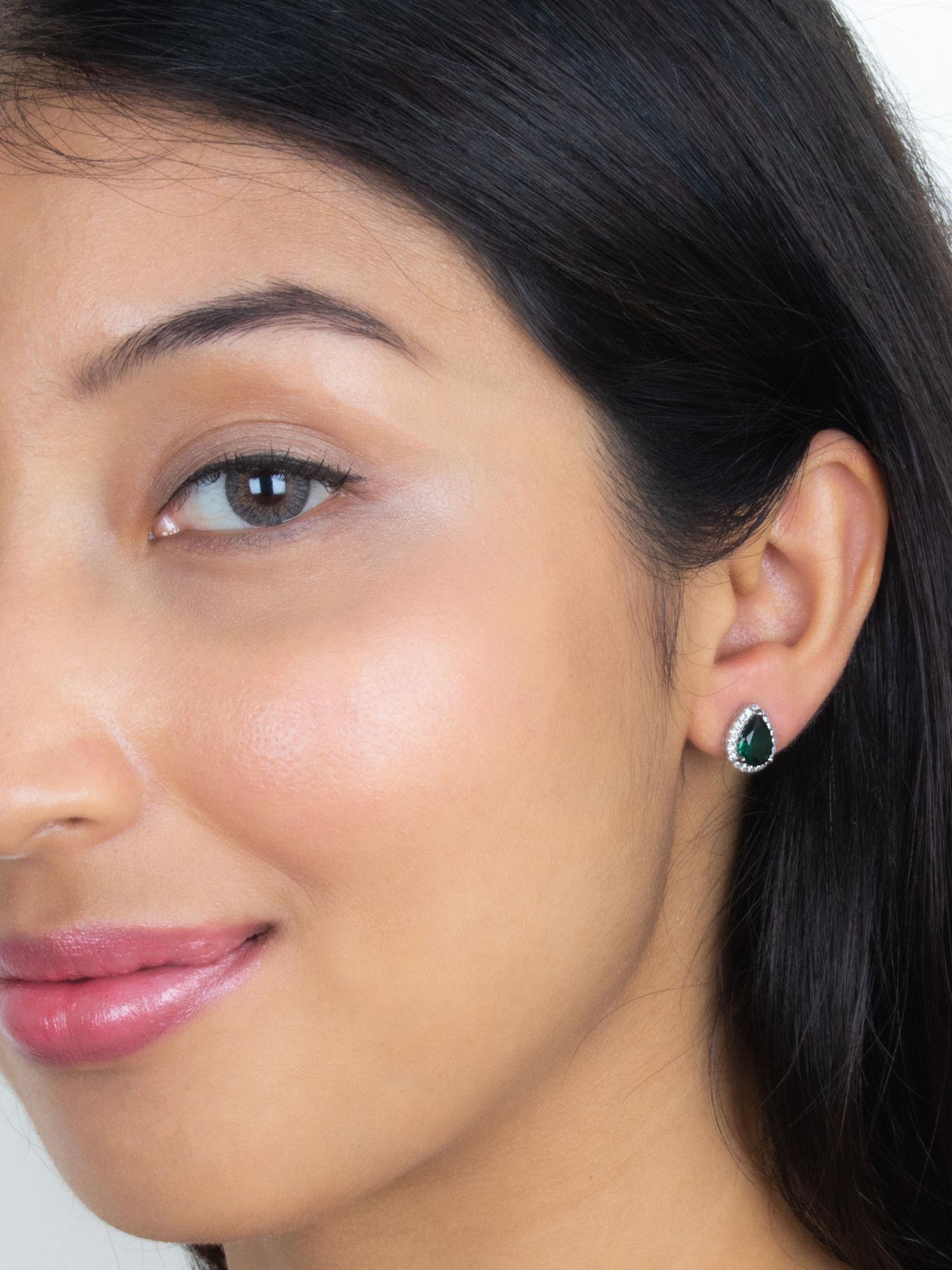 pear emerald solitaire studs