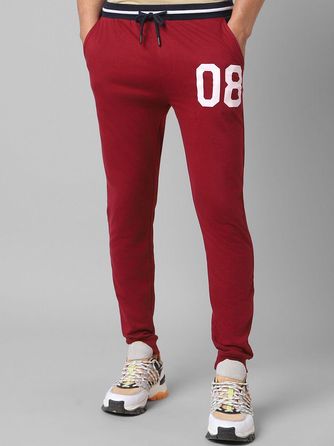 people men red typography printed mid-rise joggers