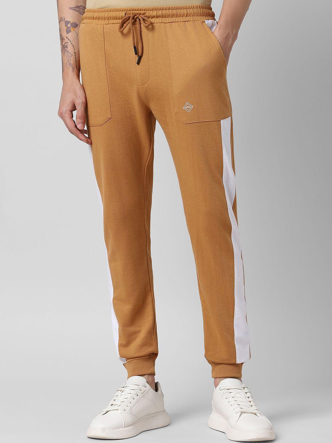 people men mustard yellow mid rise joggers