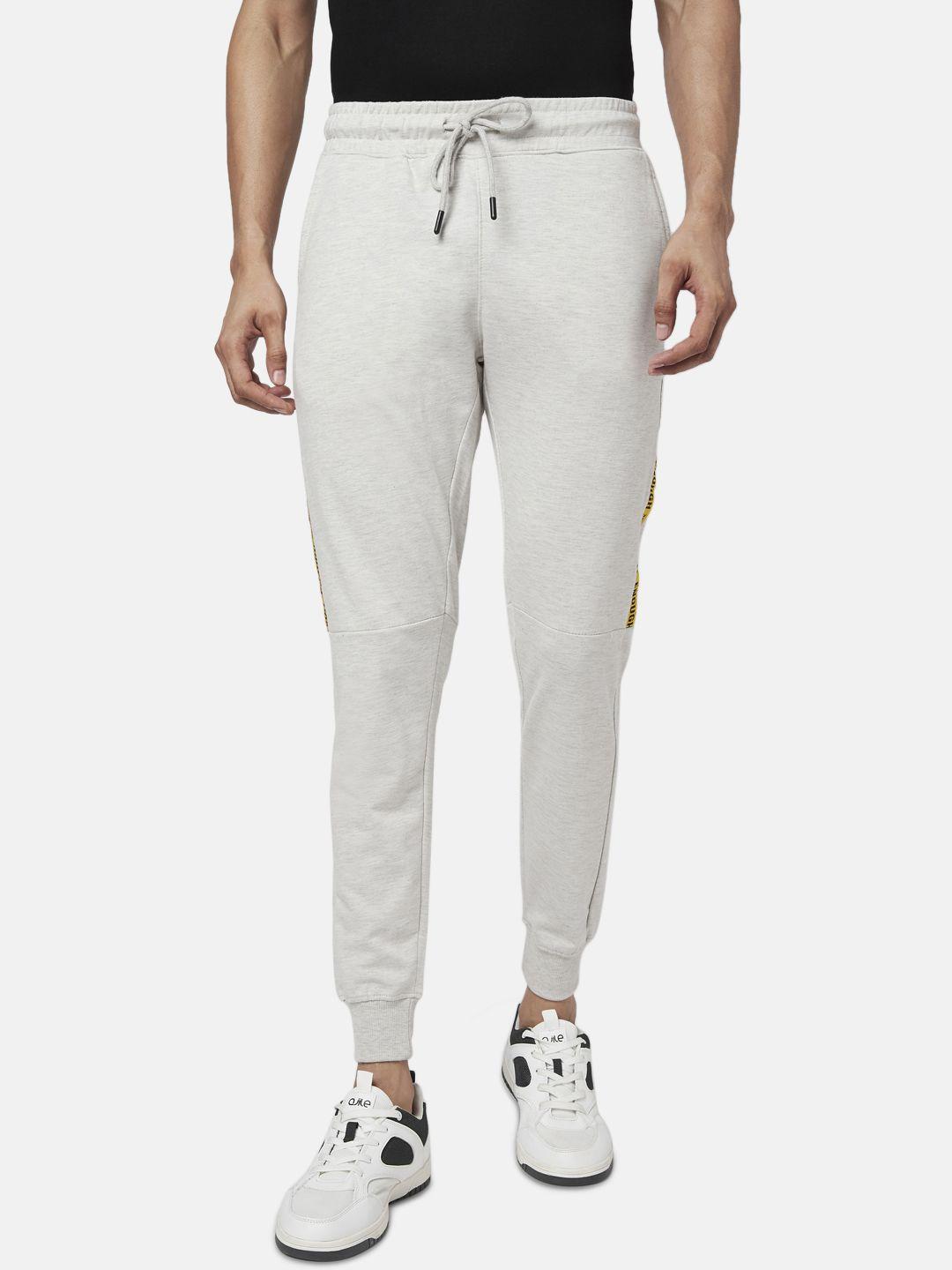 people men off white slim fit joggers