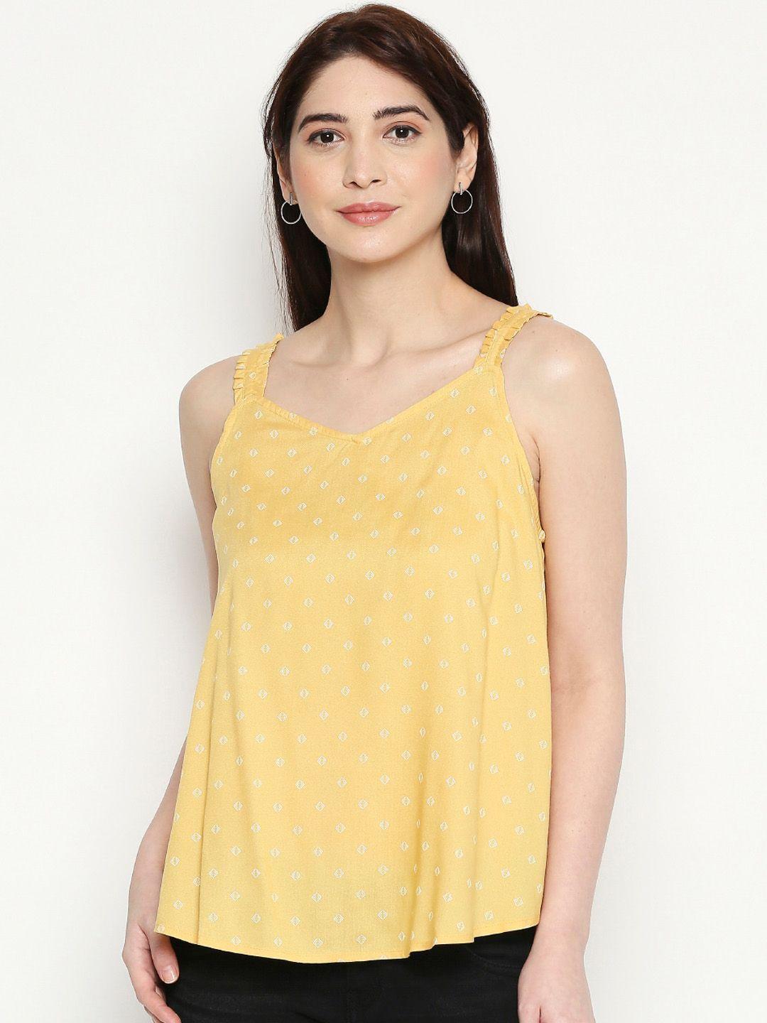 people women yellow printed top