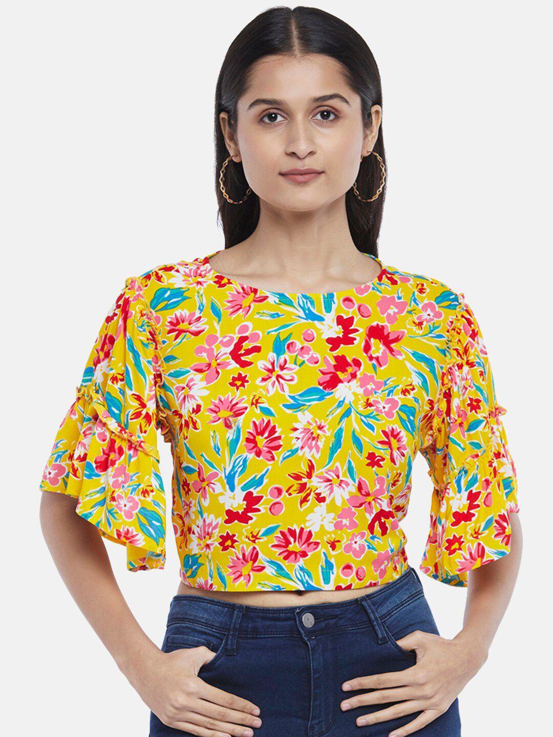 people yellow floral print top