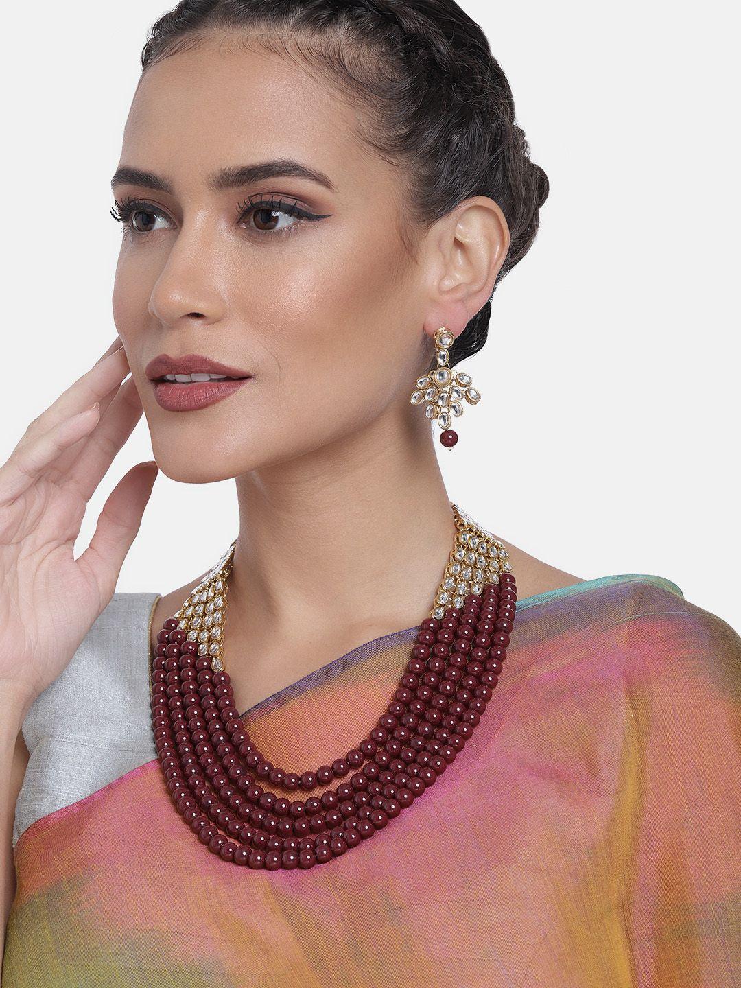 peora gold-plated faux pearl & kundan studded jewellery set