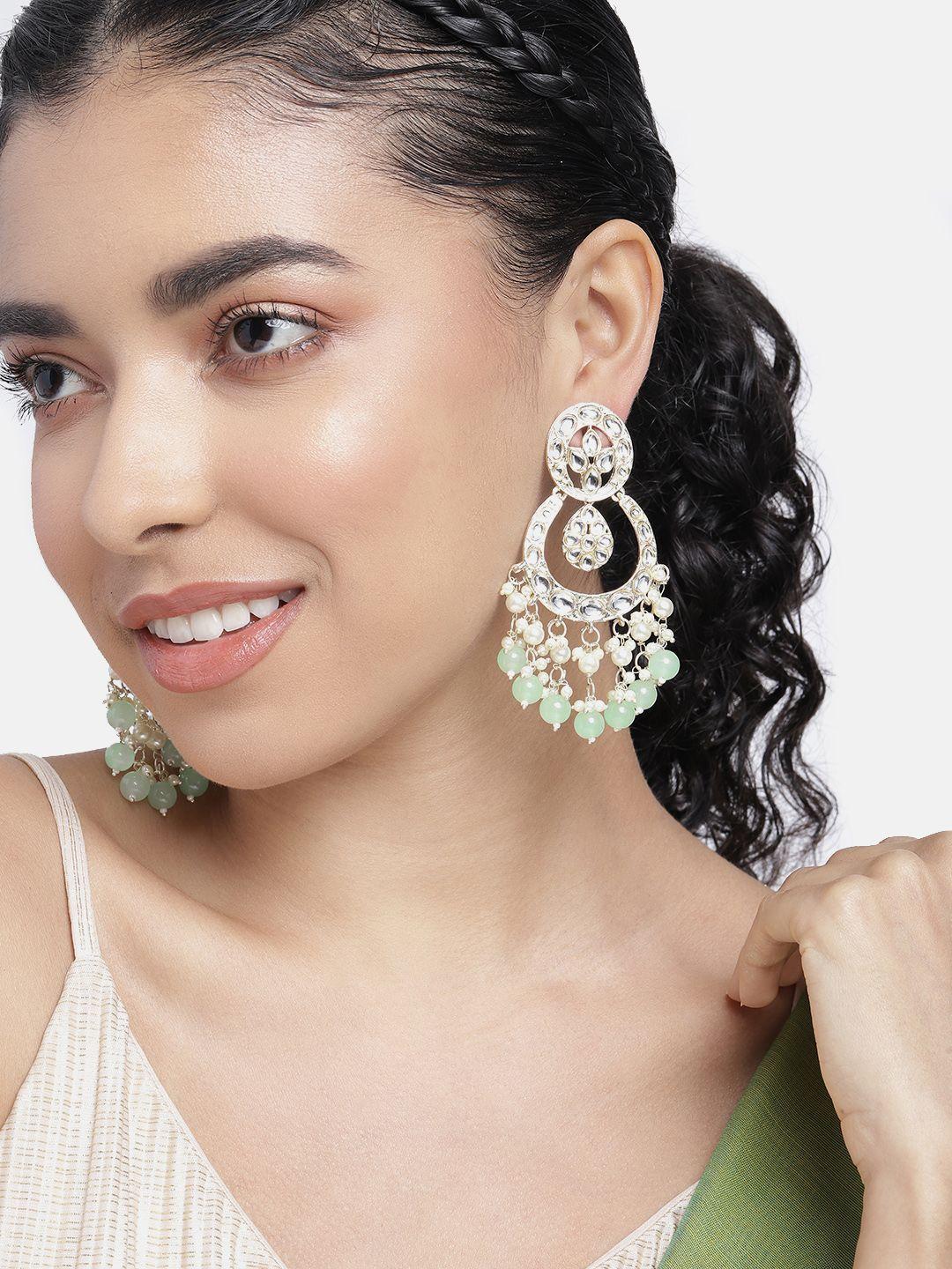 peora gold-plated kundan studded crescent shaped chandbalis earrings