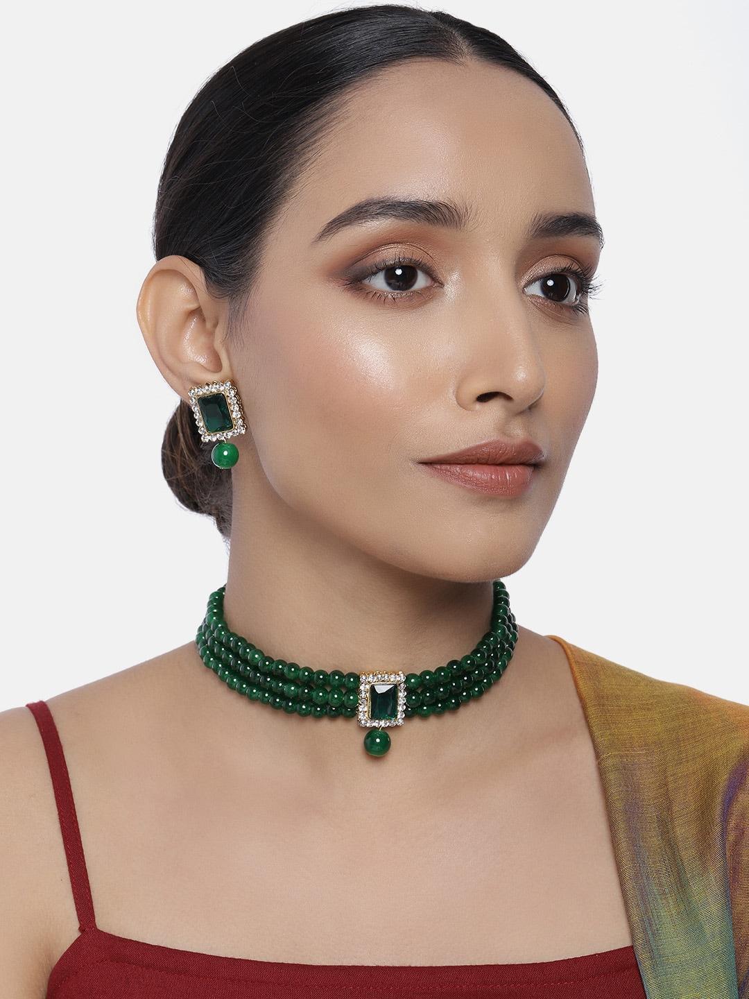 peora green gold-plated kundan jewellery set