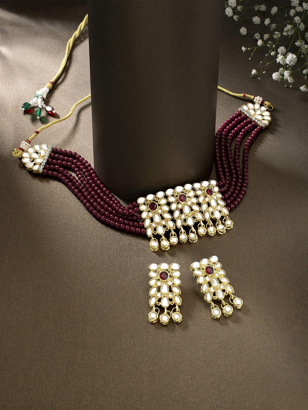 peora maroon & gold-toned kundan-studded pearl jewellery set