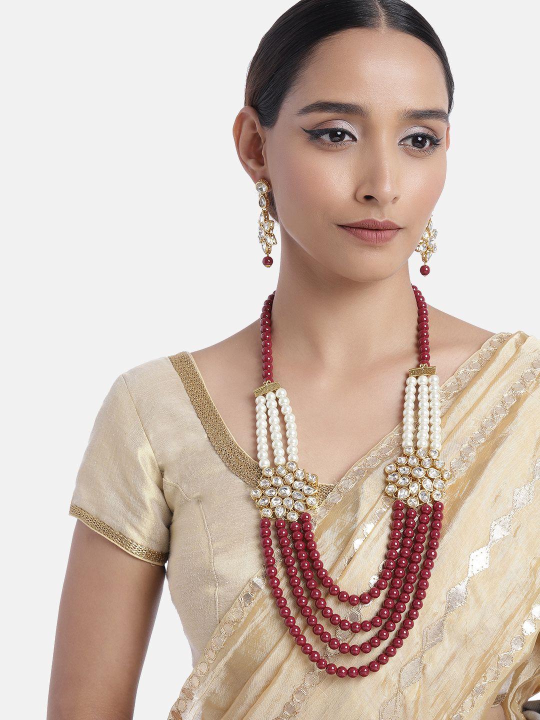 peora women maroon & white kundan studded gold plated jewellery set