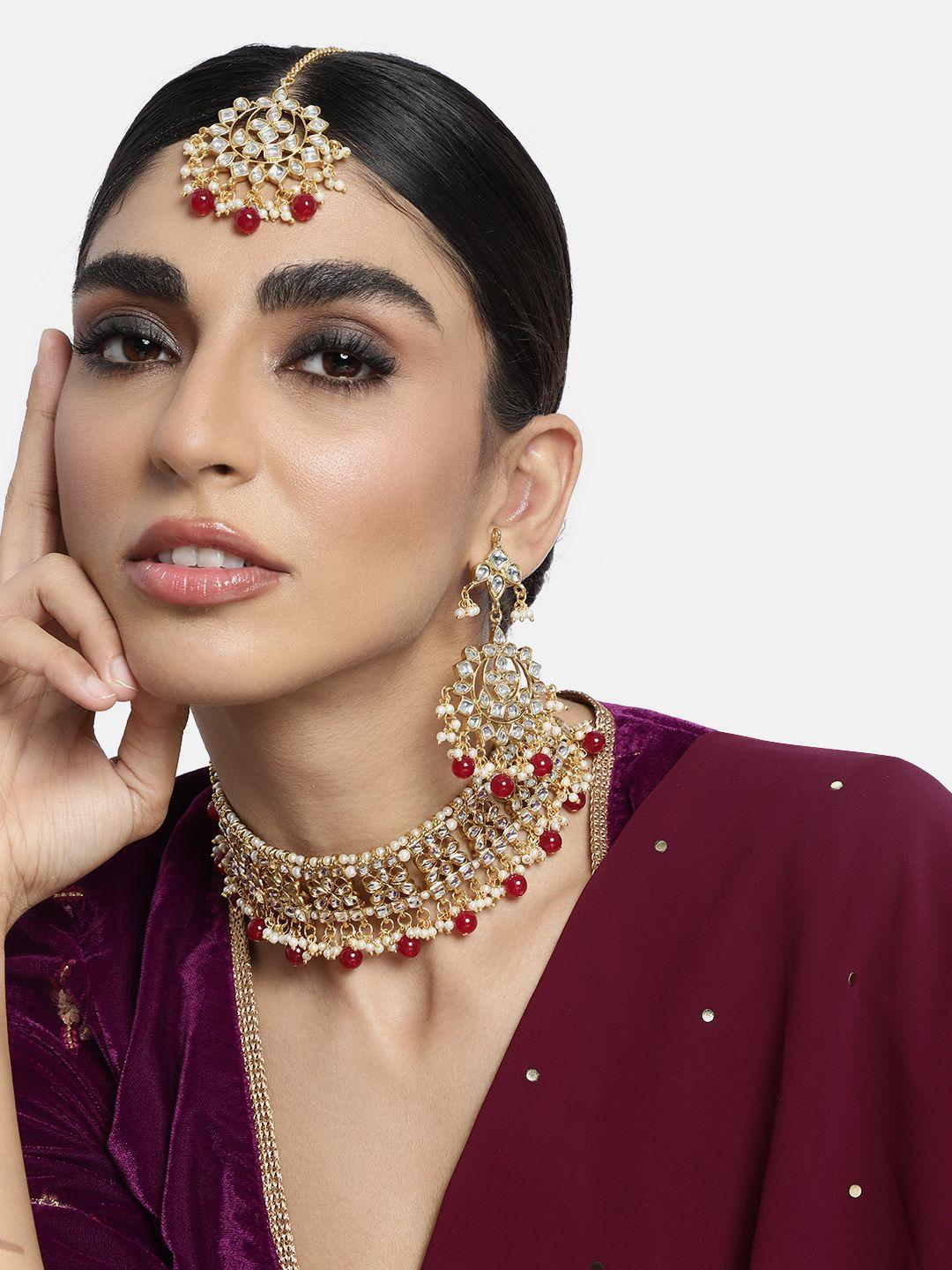 peora maroon gold-plated kundan studded jewellery set