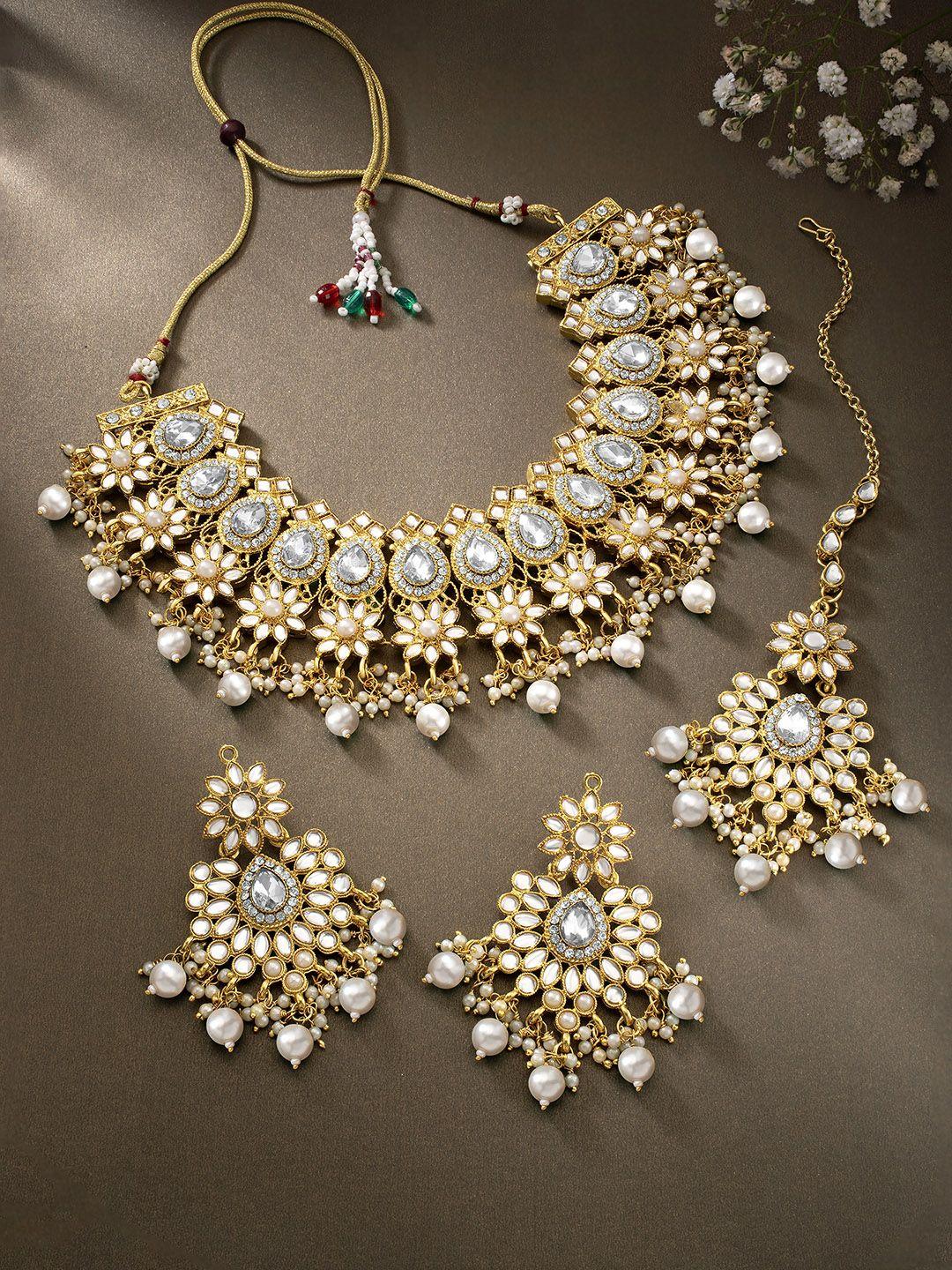 peora off-white gold-plated kundan studded & beaded jewellery set