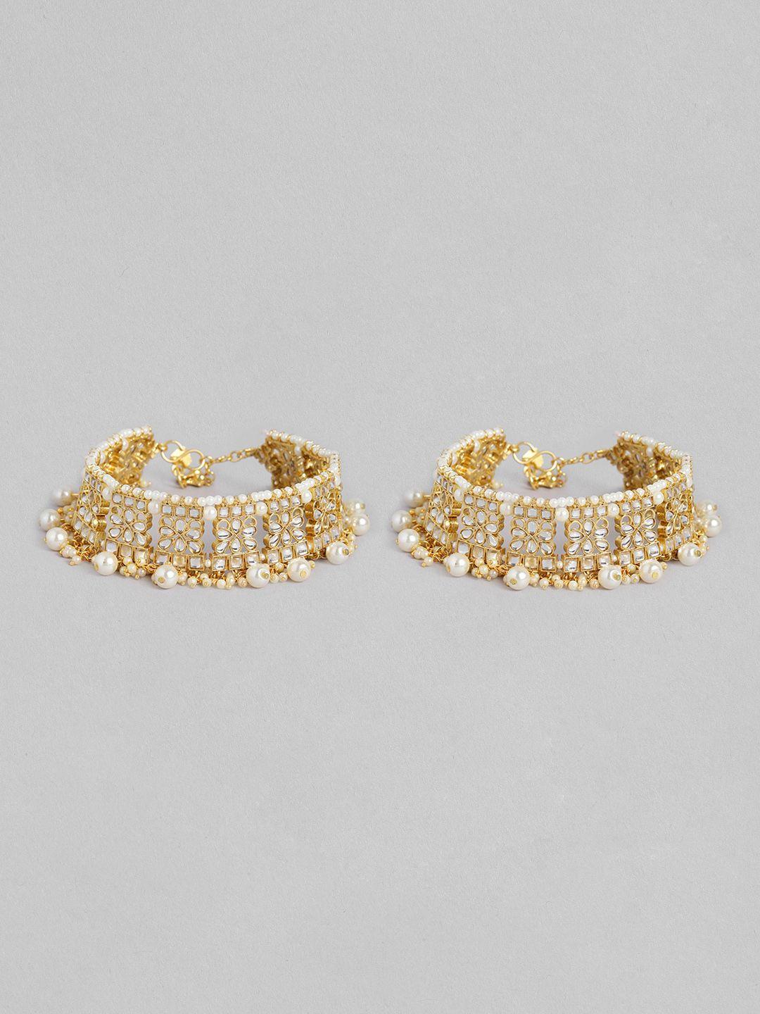 peora pair of gold-plated kundan studded anklets