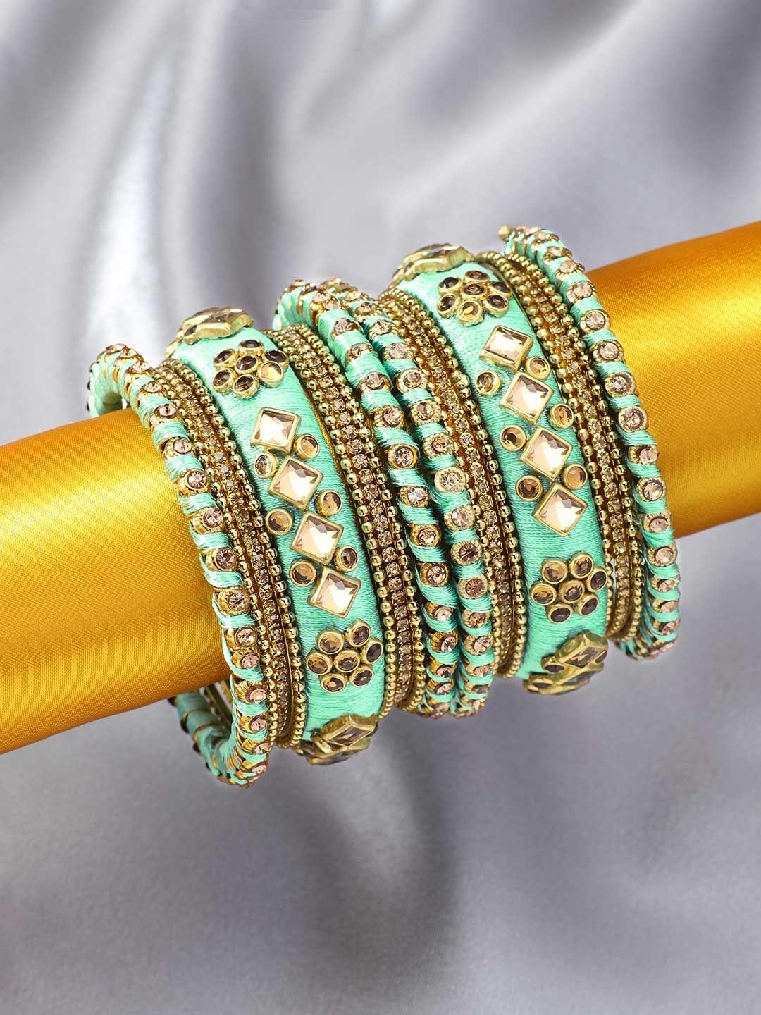 peora set of 10 sea green & gold-plated silk thread stone studded chuda bangle set