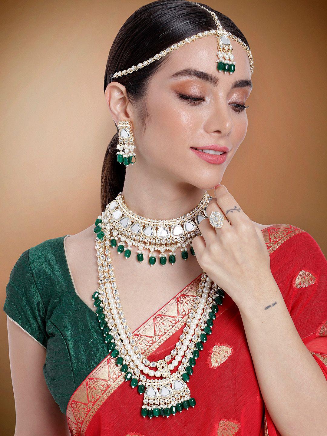 peora women gold-plated kundan studded jewellery set