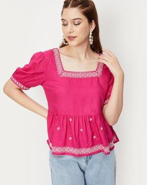 peplum top with embroidery