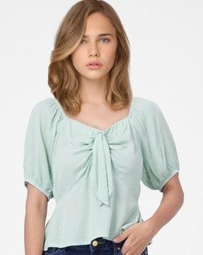 peplum top with puff sleeves