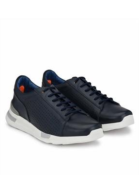 perforated lace-up sports shoes