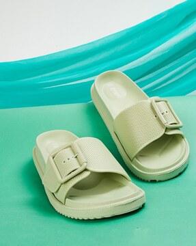 perforated slides with buckle closure