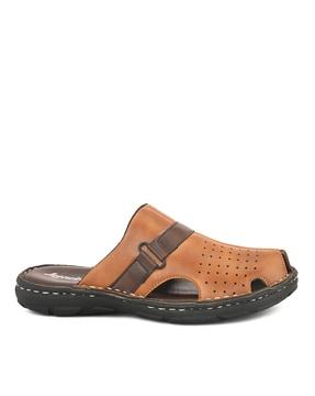 perforated slip-on clogs