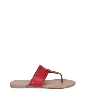 perforated t-strap flat sandals