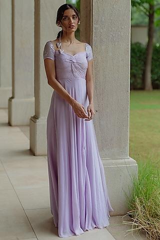 periwinkle ruched gown with sequinned sleeves