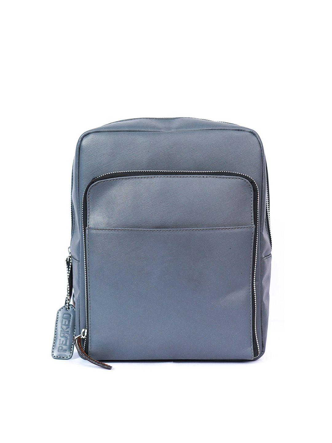 perked leather crossbody backpack with compression straps