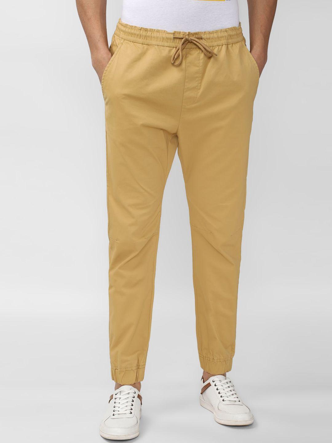 peter england casuals men yellow slim fit joggers trousers