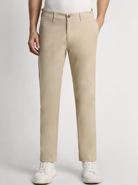 peter england beige slim fit printed trousers