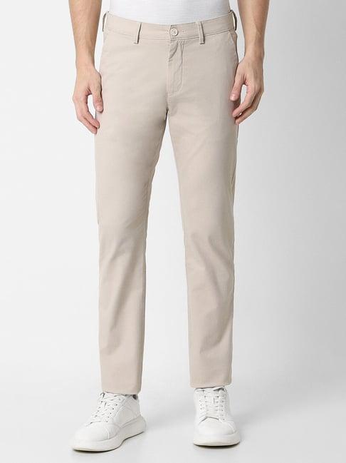 peter england beige slim fit trousers