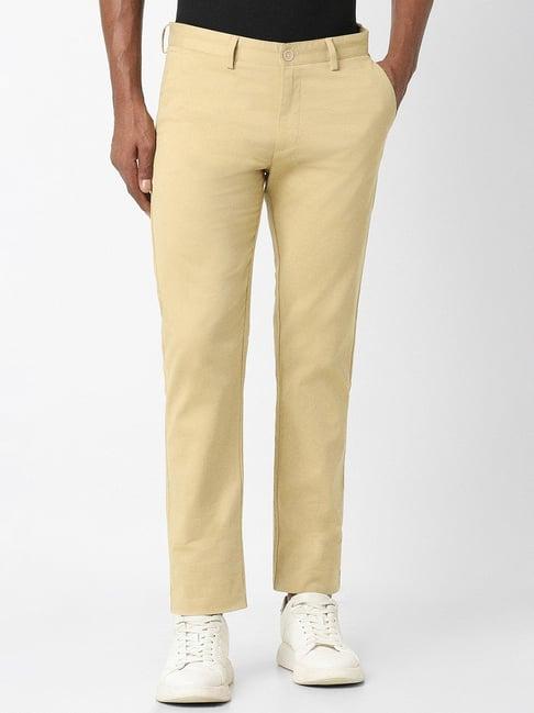 peter england beige slim fit trousers