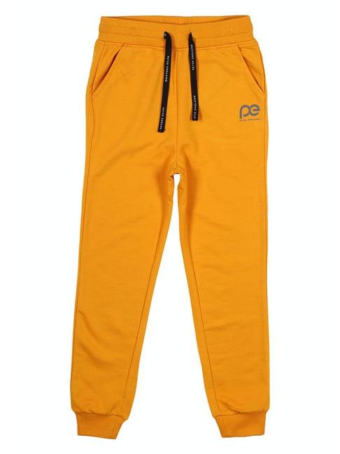 peter england kids yellow solid joggers