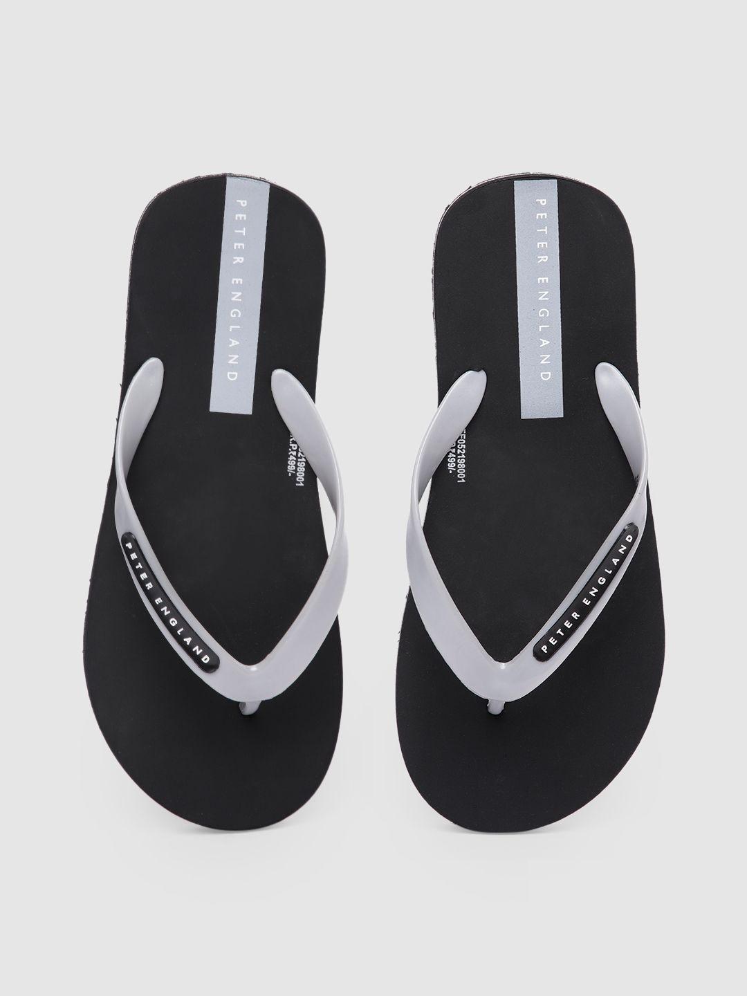 peter england men black & grey solid rubber thong flip-flops with brand logo printed