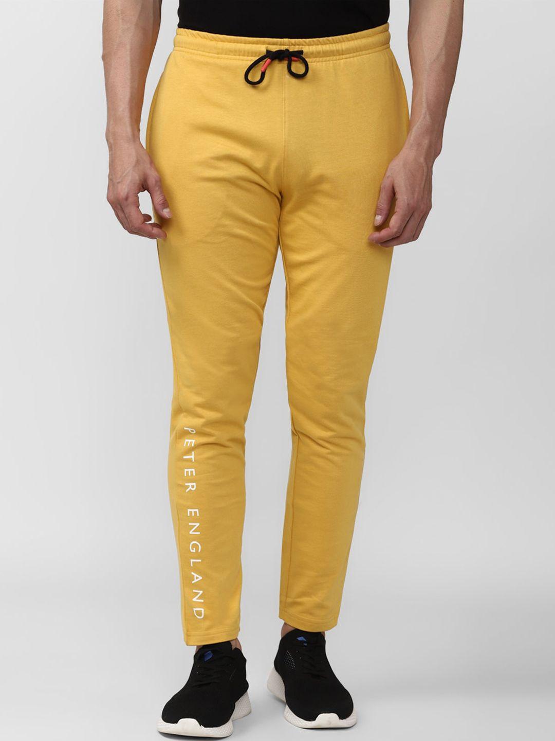 peter england men yellow solid track pants