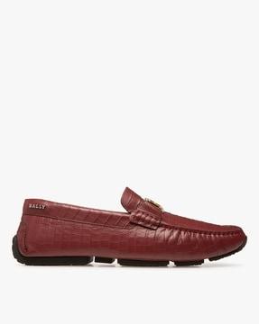 pilot loafers with metal logo accent