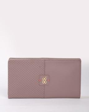 pinhole bi-fold wallet