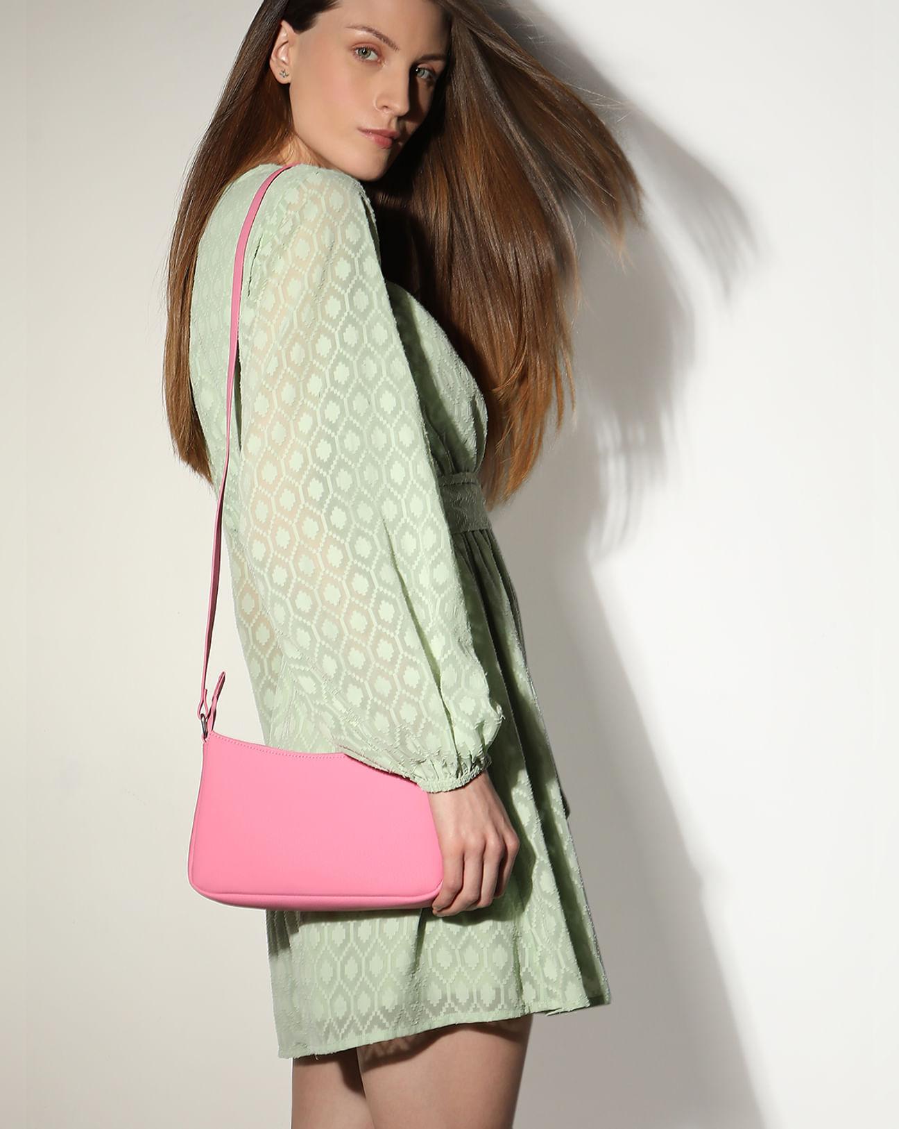 pink textured sling bag
