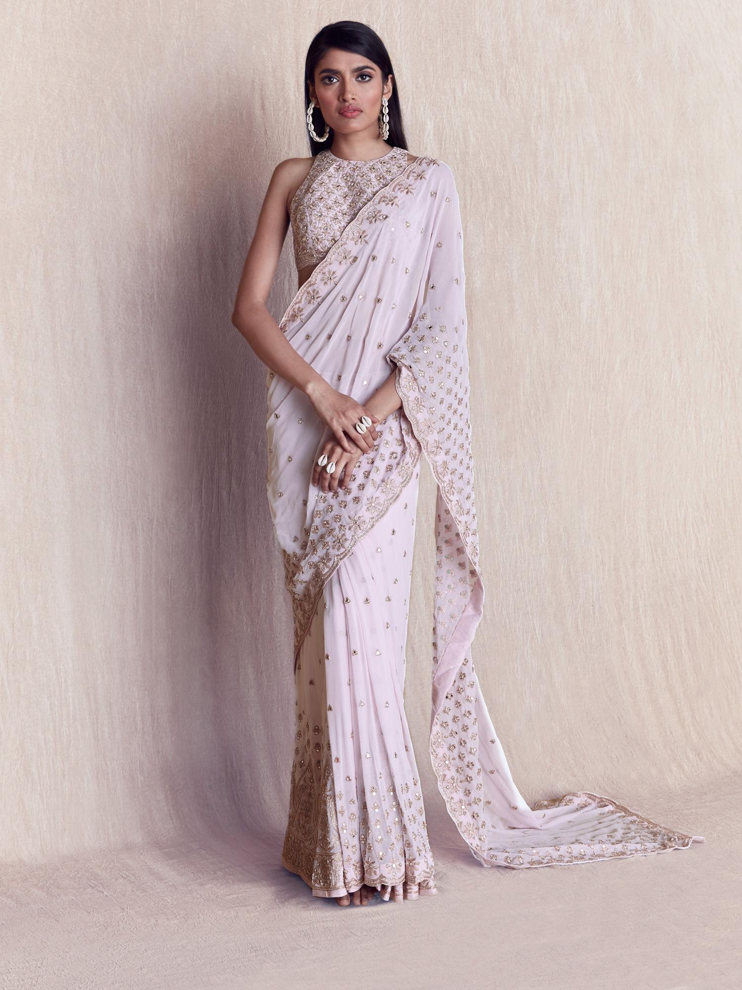 pink embellished saree with halter embellished stitched blouse