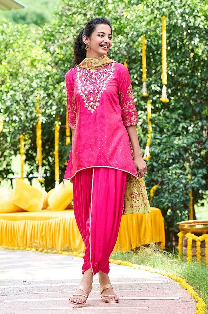 pink embroidered short kurta with dhoti pants and green dupatta