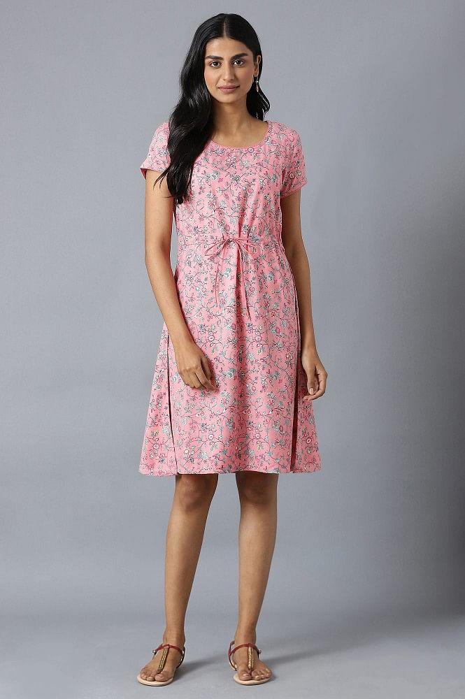 pink flared dress in floral print and round neck