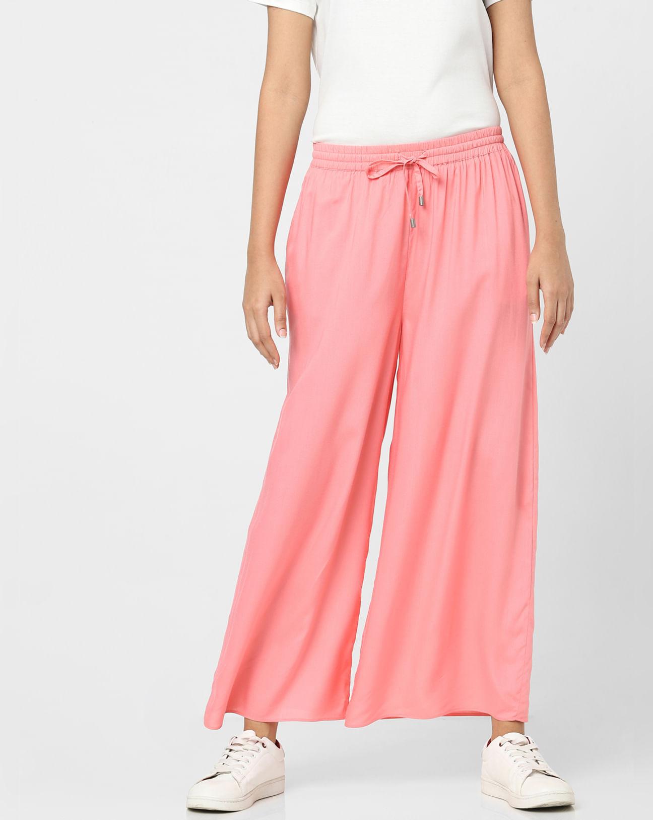 pink plain coloured trousers