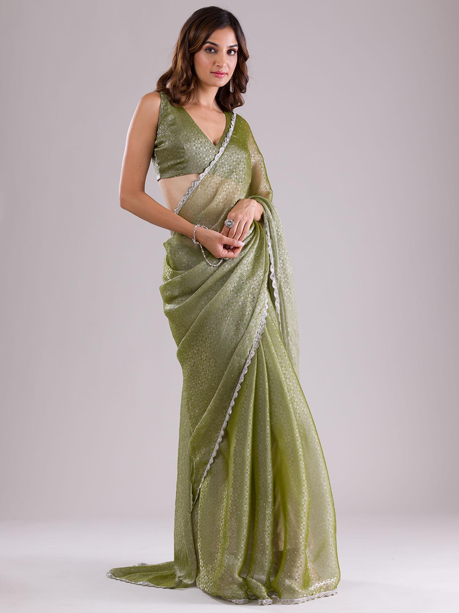 pista green embellished stone work semi crepe saree with unstitched blouse