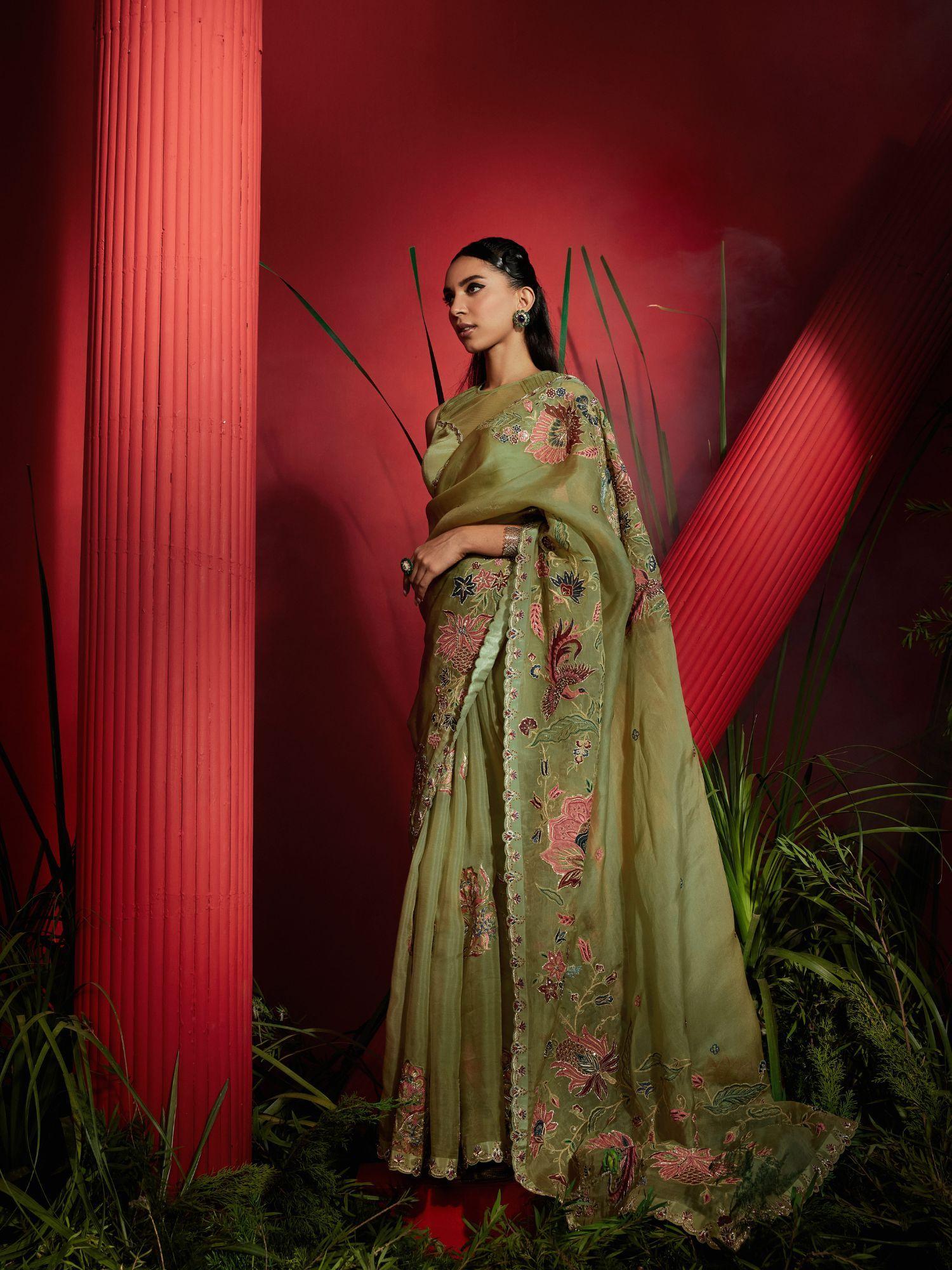 pista green organza silk hand embroidered saree with stitched blouse