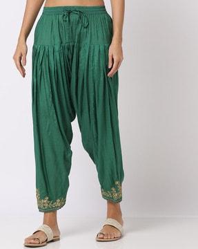 pleat-front churidar with embroidered hem