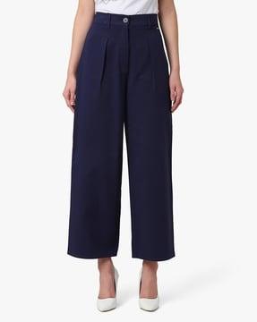 pleat-front pants with patch pockets