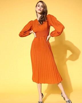 pleated empire dress with puff sleeves