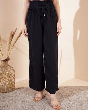 pleated flared trousers with elasticated drawstring waist