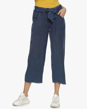 pleated-front pants with belt applique