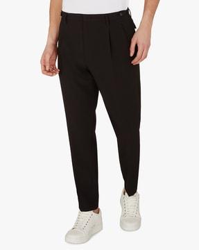 pleated mid-rise trousers