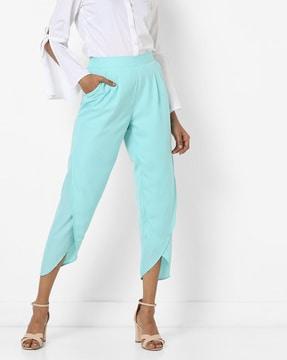pleated pants with tulip hems