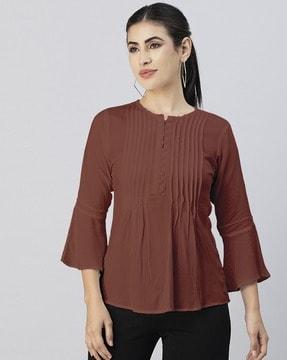 pleated top with bell sleeves