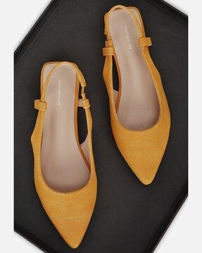 pointed-toe slingback mules